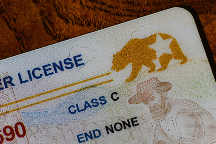 Lake Elsinore, California, USA - Dec 18, 2022: Closeup of California Real ID driver license focusing on the REAL ID logo