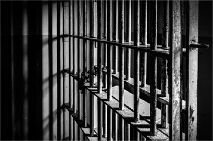 prison-cell-bars-istock-357.jpg