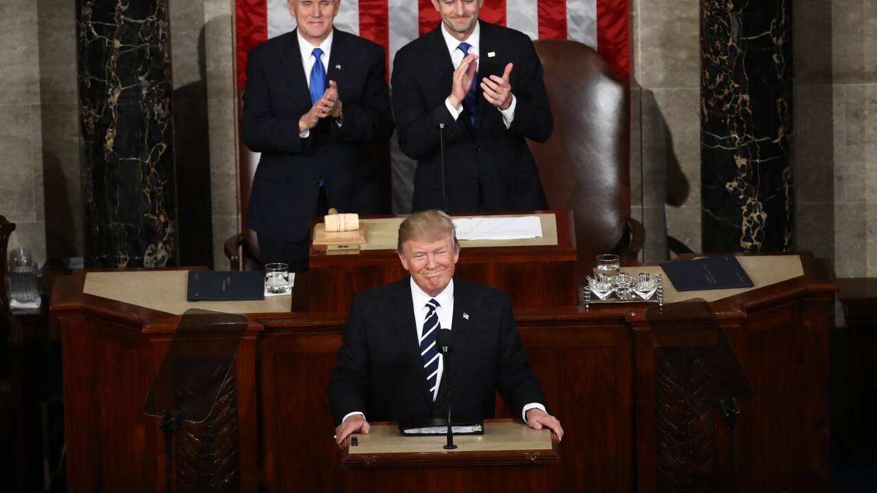 President Donald Trump with Vice President Mike Pence and House Speaker Paul Ryan at address to joint session of Congress