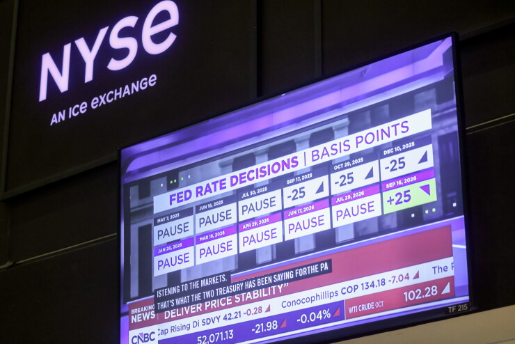 Traders at NYSE As Fed Chair Warsh Holds New Conference