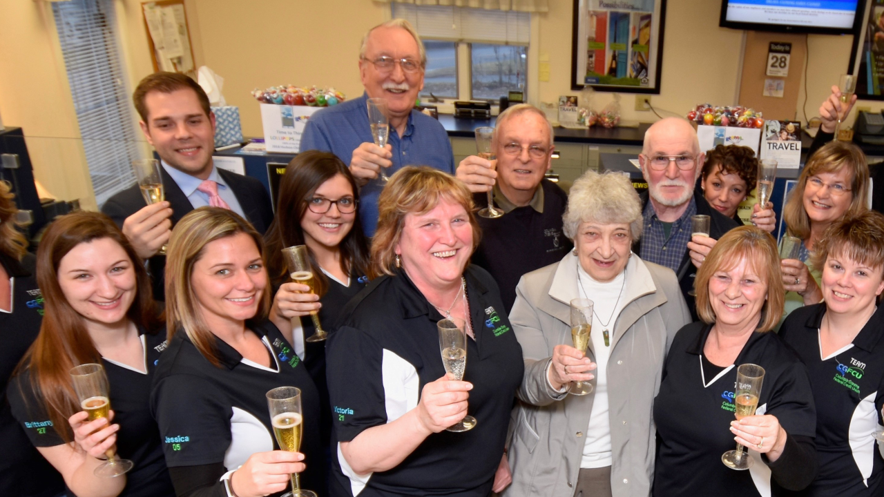Columbia-Greene Federal Credit Union staff celebrate the CU's conversion to a community charter