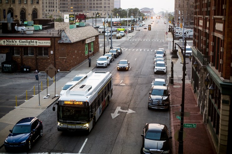A Detroit Department of Transportation bus travels along Grand River Avenue in Detroit, Michigan, U.S., on Tuesday, Aug. 14, 2018.