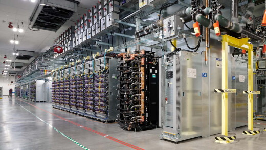 Server aisles and coolant distribution units at Google's New Albany, Ohio data center.