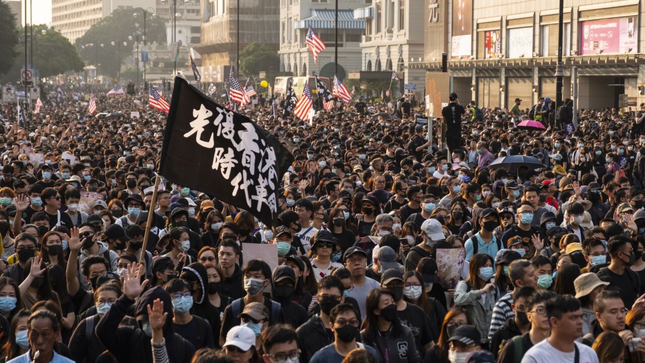 Demonstrators occupied the street during a protest in the Tsim Sha Tsui district of Hong Kong, China, on Sunday, Dec. 1, 2019. China said it "strongly" opposed an op-ed by United Nations High Commissioner for Human Rights Michelle Bachelet, accusing her of meddling in the country's affairs and emboldening Hong Kong protesters to commit violence. Photographer: Chan Long Hei/Bloomberg