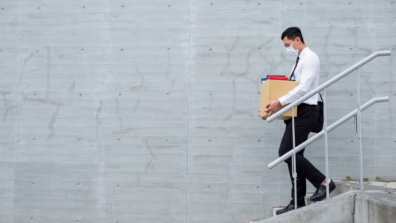 Asian man being fired