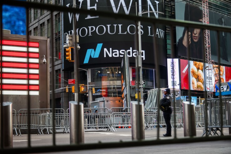A Nasdaq sign on a building