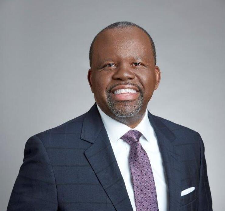 Darrin Williams, the CEO of Southern Bancorp, wearing purple tie and dark suit jacket