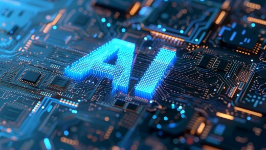 Image of the letters AI over a computer motherboard.