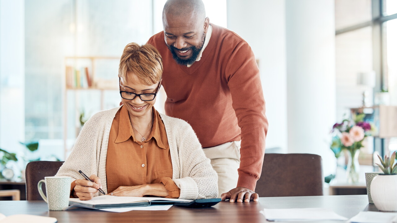Black couple, budget and check savings for investment, retirement plan and smile together. Man, woman and manage finance for retired years, banking for future and happy with money growth and profits.