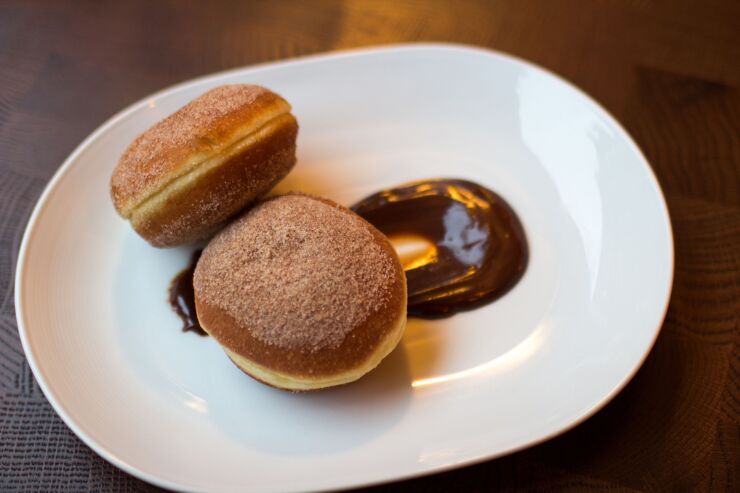 Berliner donuts, filled with Goldschlager cream, are served at The Marrow in New York, Feb. 19, 2013. The Marrow is a half-German, half-Italian meatery where the sauerbraten is even better than the steak. Photographer: Philip Lewis/Bloomberg