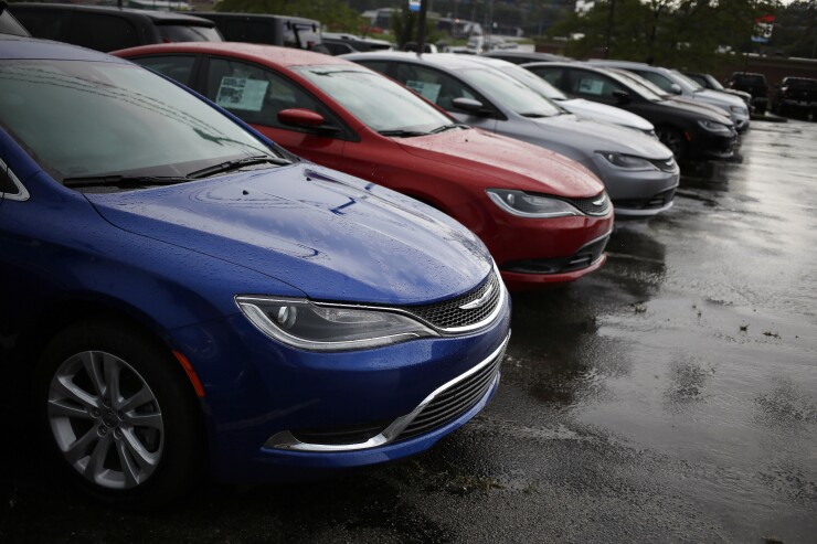 A row of cars on display at a dealership in Kentucky.