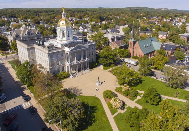 The New Hampshire State House in Concord. S&P raised the state's general obligations bonds to AA-plus. 