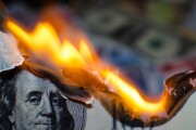 Burning one hundred dollar