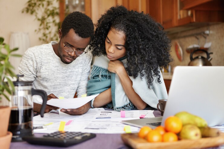 Couple with paperwork