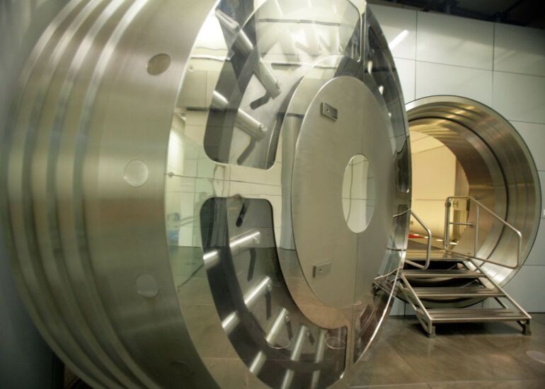 The bank vault is photographed with it's door open in a secu