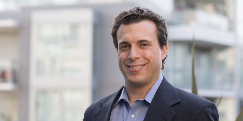 Headshot of Avi Tuschman.