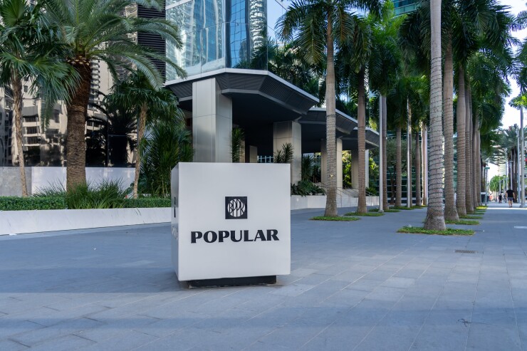 Miami, FL, USA - January 2, 2022: Popular Bank in Miami, FL, USA. Popular Bank is a financial services conglomerate