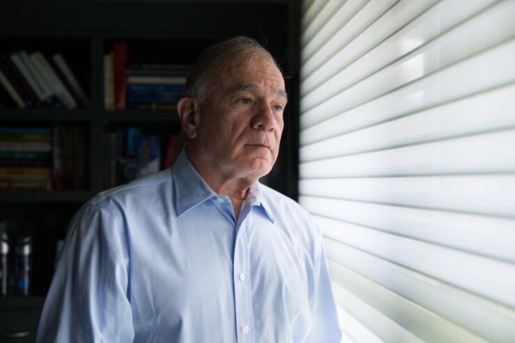 Lawrence Seidman, manager of Seidman & Associates, stands for a photograph in Wayne, New Jersey.