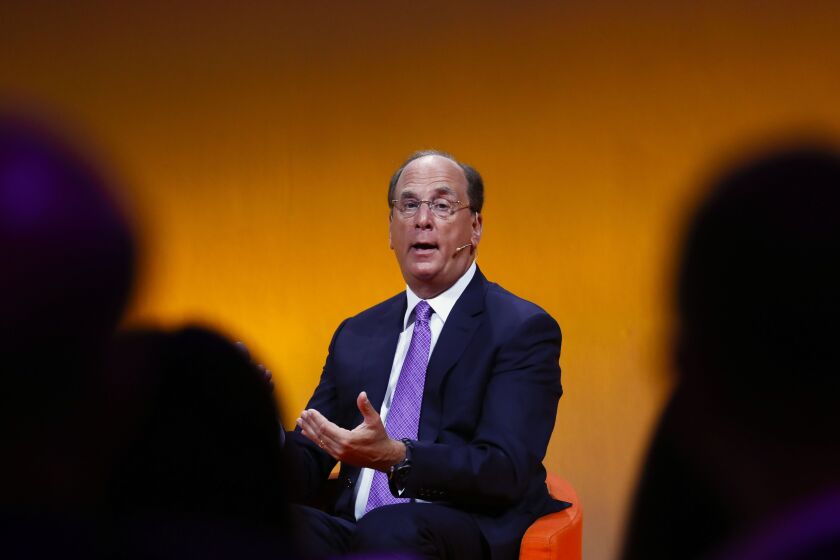 BlackRock CEO Larry Fink personally made calls to some of the major investors that ended up participating in the transaction, people familiar with the matter said.