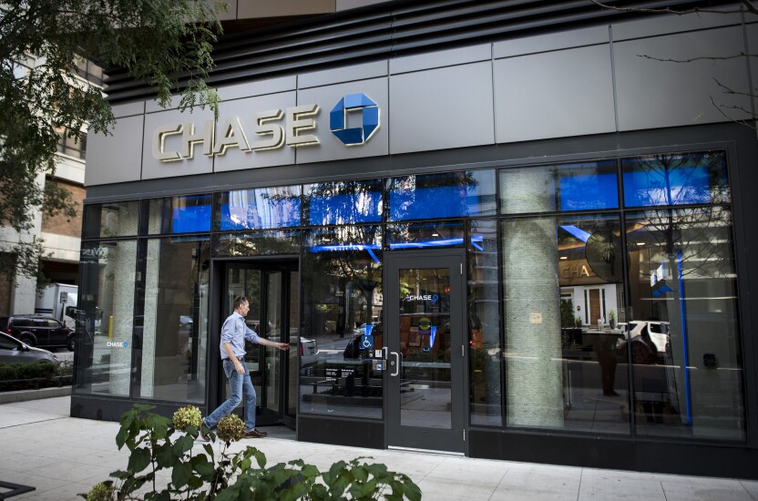 A customer enters a JPMorgan Chase bank branch in downtown Chicago.