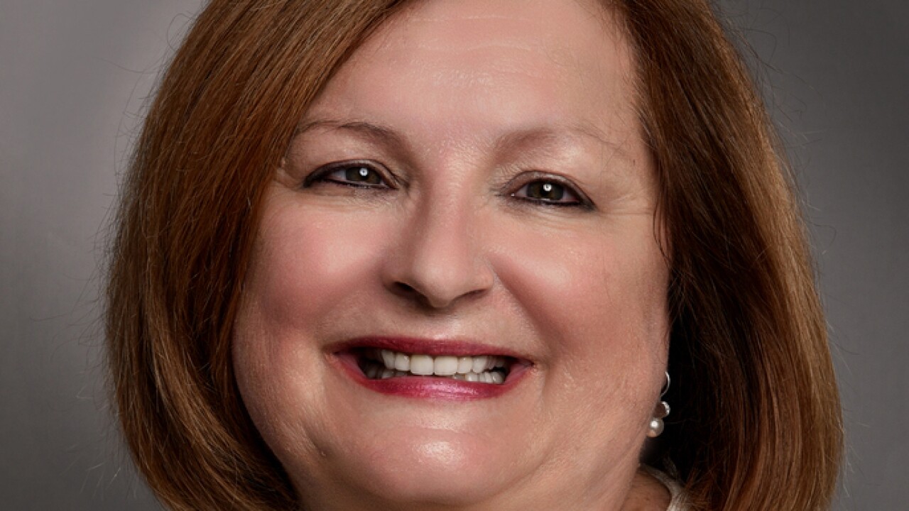 Portrait of Patti Clement, executive vice president of HUB International