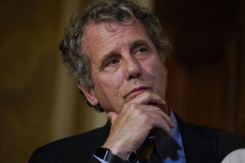 Sen. Sherrod Brown, Ohio Democrat, is co-sponsoring legislation that would call for a four-month moratorium on all negative credit reporting.