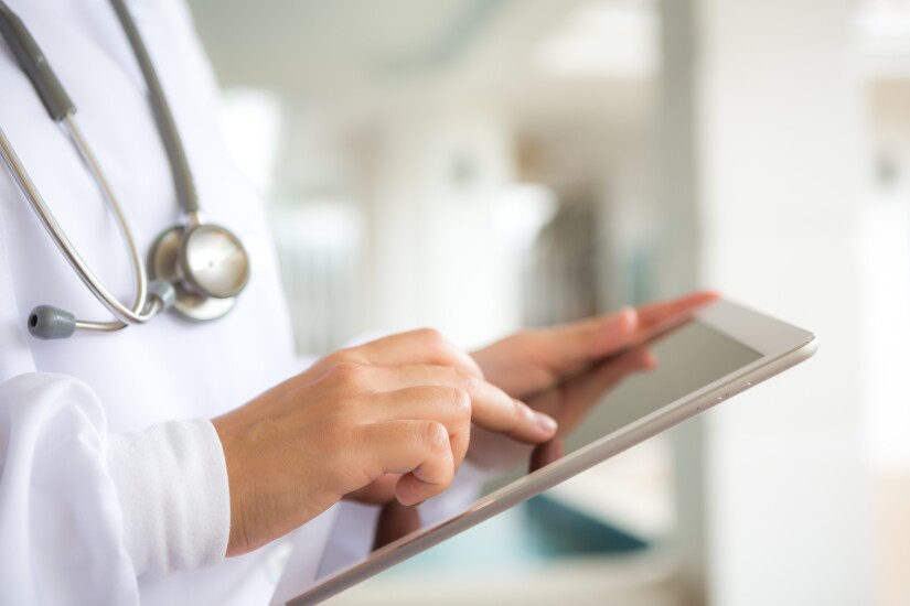 Doctor using a tablet