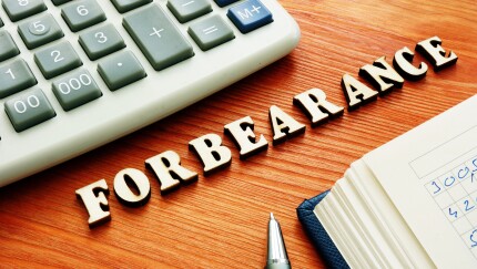 Forbearance word from wooden letters.
