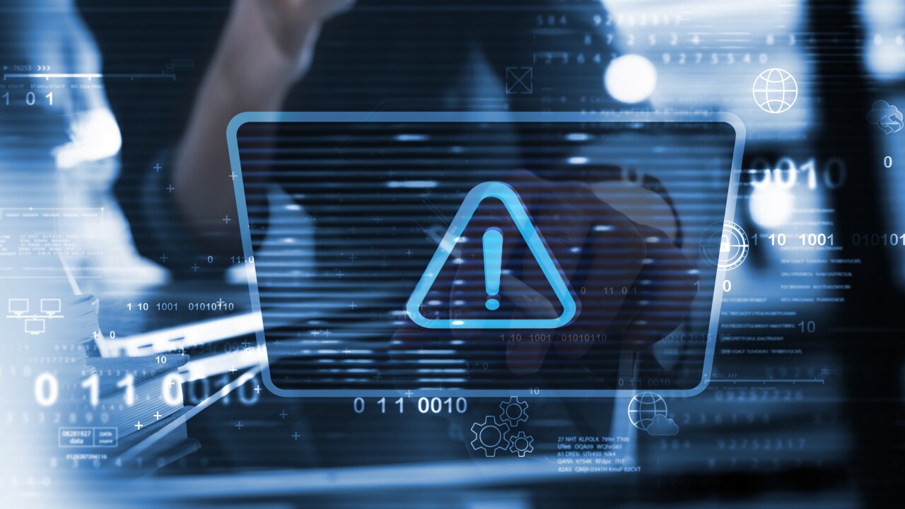 Cybersecurity warning screen with exclamation point inside triangle