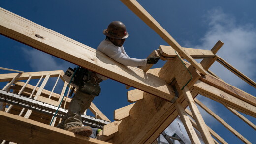 Worker building house in Lillington, North Carolina, in 2023