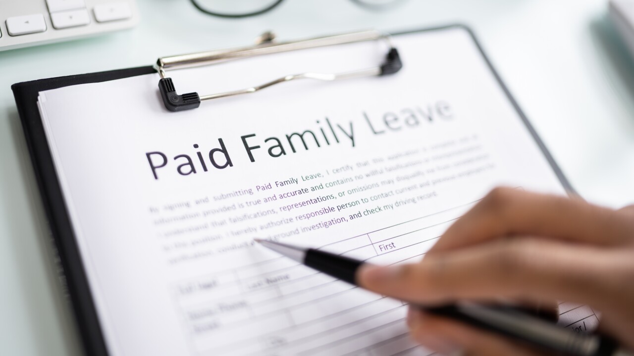 A sheet of paper that says: "Paid Family Leave."