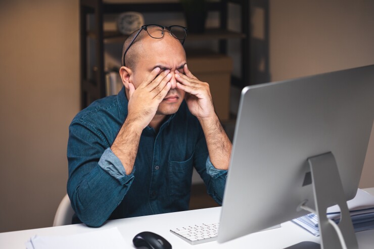 Man stressed at work