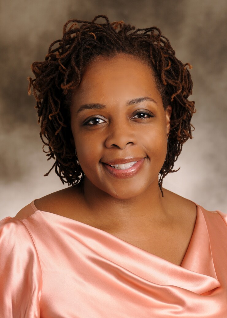 Susan Chapman Hughes, a senior vice president and American Express Global Commercial Payments.