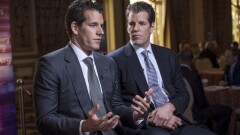 Cameron Winklevoss, chief executive officer and co-founder of Gemini Trust Company LLC, left, speaks as Tyler Winklevoss, chief financial officer and co-founder of Gemini Trust Company LLC, listens.