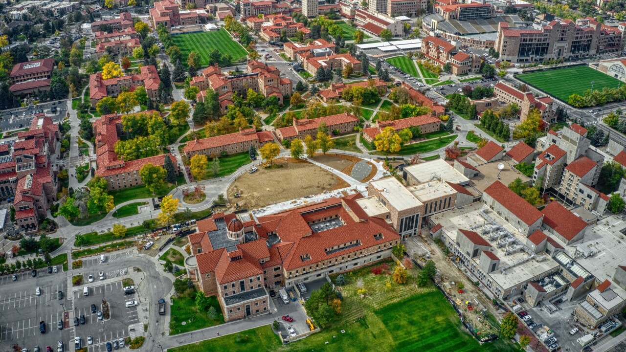 Boulder-based bank. alleges rival bank tried to bar it from lucrative business