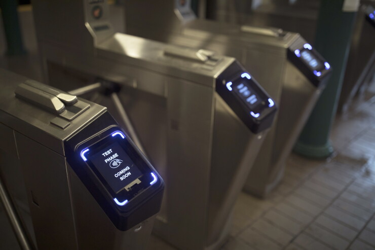 Monitors for the new Metropolitan Transportation (MTA) contactless fare payment system, known as the One Metro New York (OMNY)
