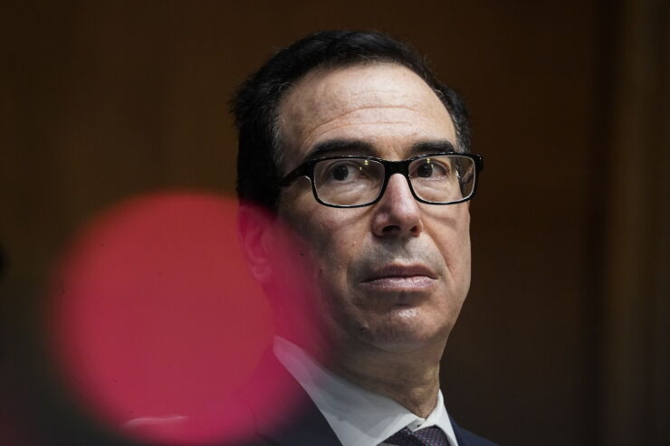 Treasury Secretary Steven Mnuchin listens during a Senate Banking, Housing and Urban Affairs Committee hearing in Washington on Sept 24, 2020.