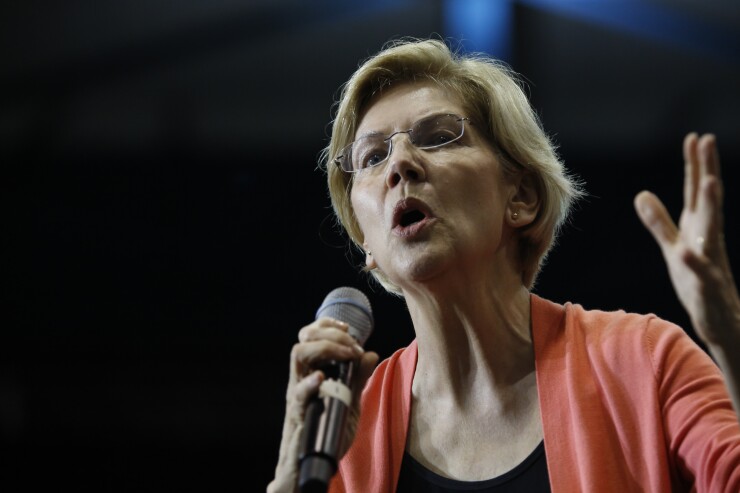 Sen. Elizabeth Warren, D-Mass., speaks during a town hall event in Miami on June 25, 2019.