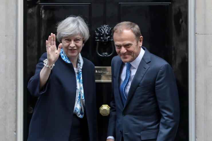 U.K. Prime Minister Theresa May outside her residence at 10 Downing Street in London with European Union President Donald Tusk