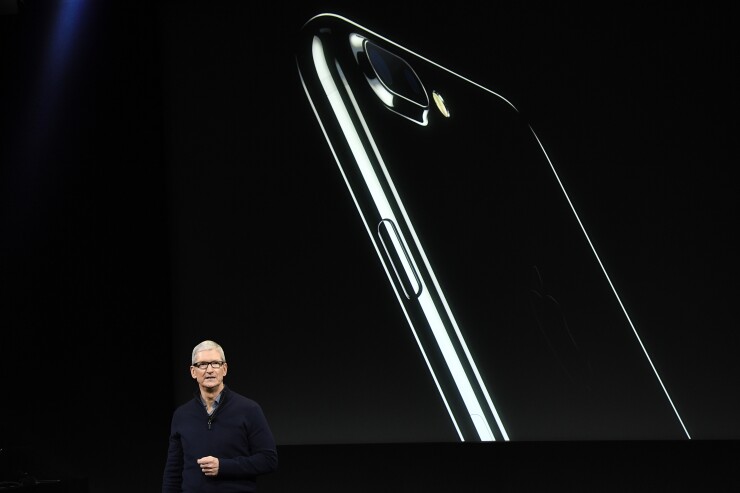 Apple CEO Tim Cook with iPhone