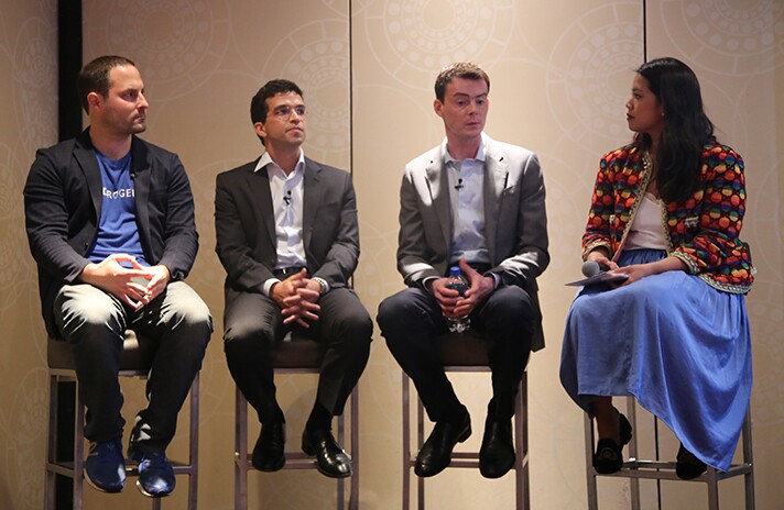 Andrew Brzezinski, vice president of Fidelity Institutional (second from right) and Massimo Young, head of data solutions at Bank of New York Mellon (third from left).