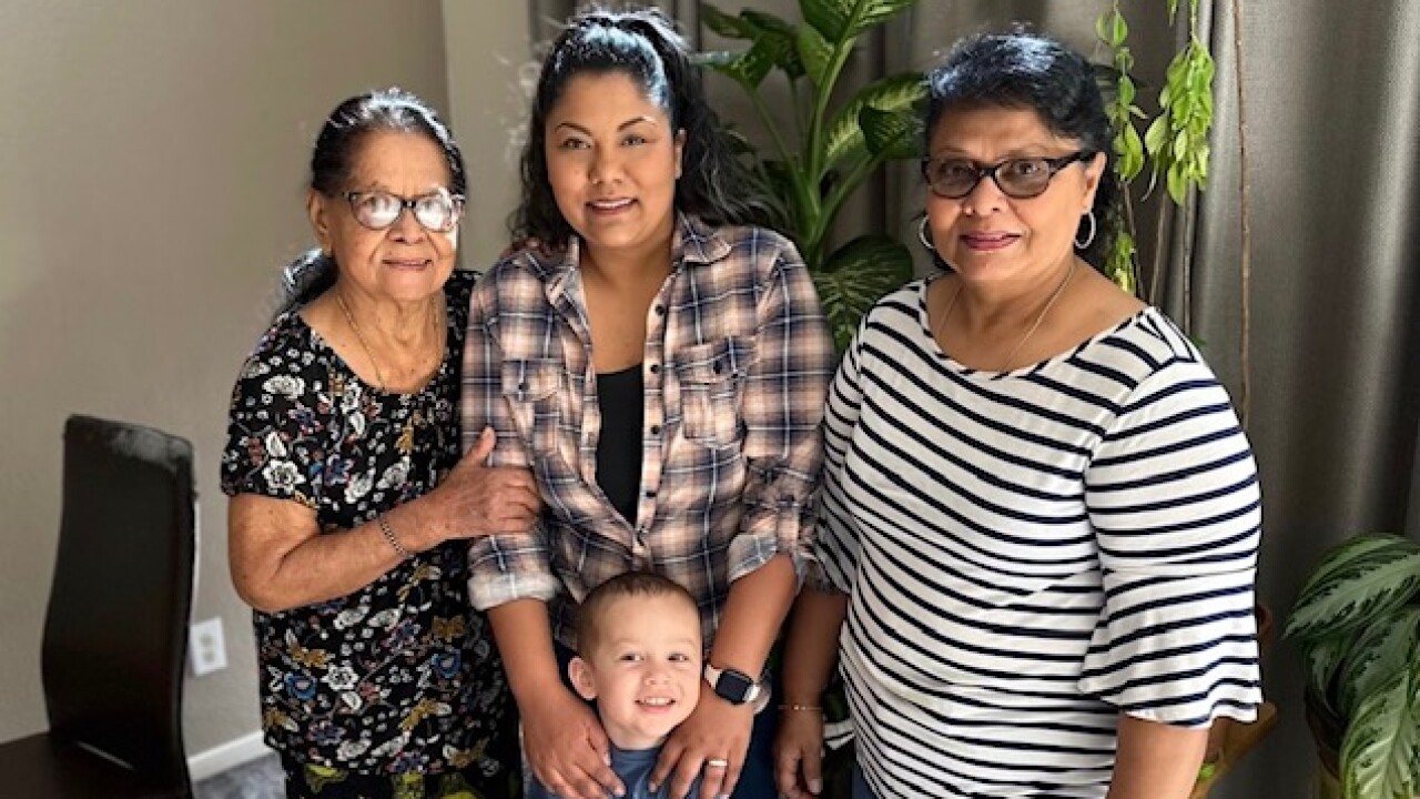 Four generations of one family gather at the grandmother's home thanks