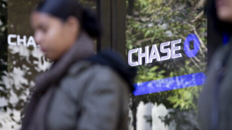 A pedestrian walks past a JPMorgan Chase bank branch in Chicago on Oct. 12, 2019.