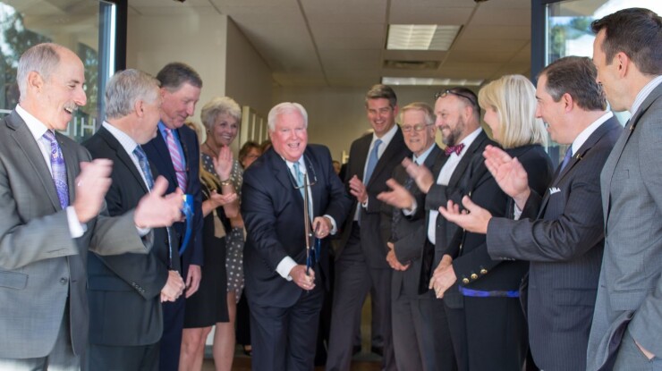 CEO Jim Allen cuts ribbon Hilliard Lyons - new branch Asheville, North Carolina