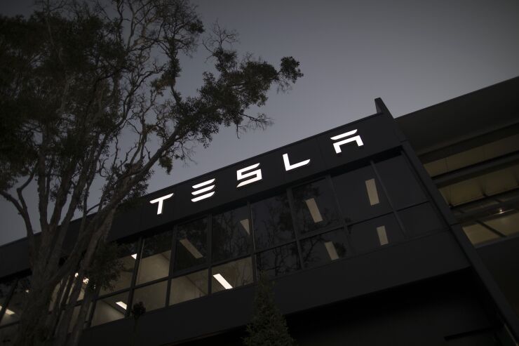 Exterior of Tesla office building at night