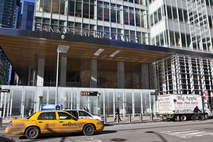 Traffic passes by the Bank of America Tower in New York.