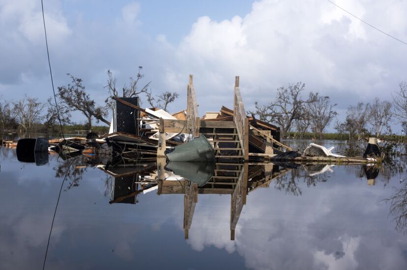 Remains Of A House Submerged In Floodwater