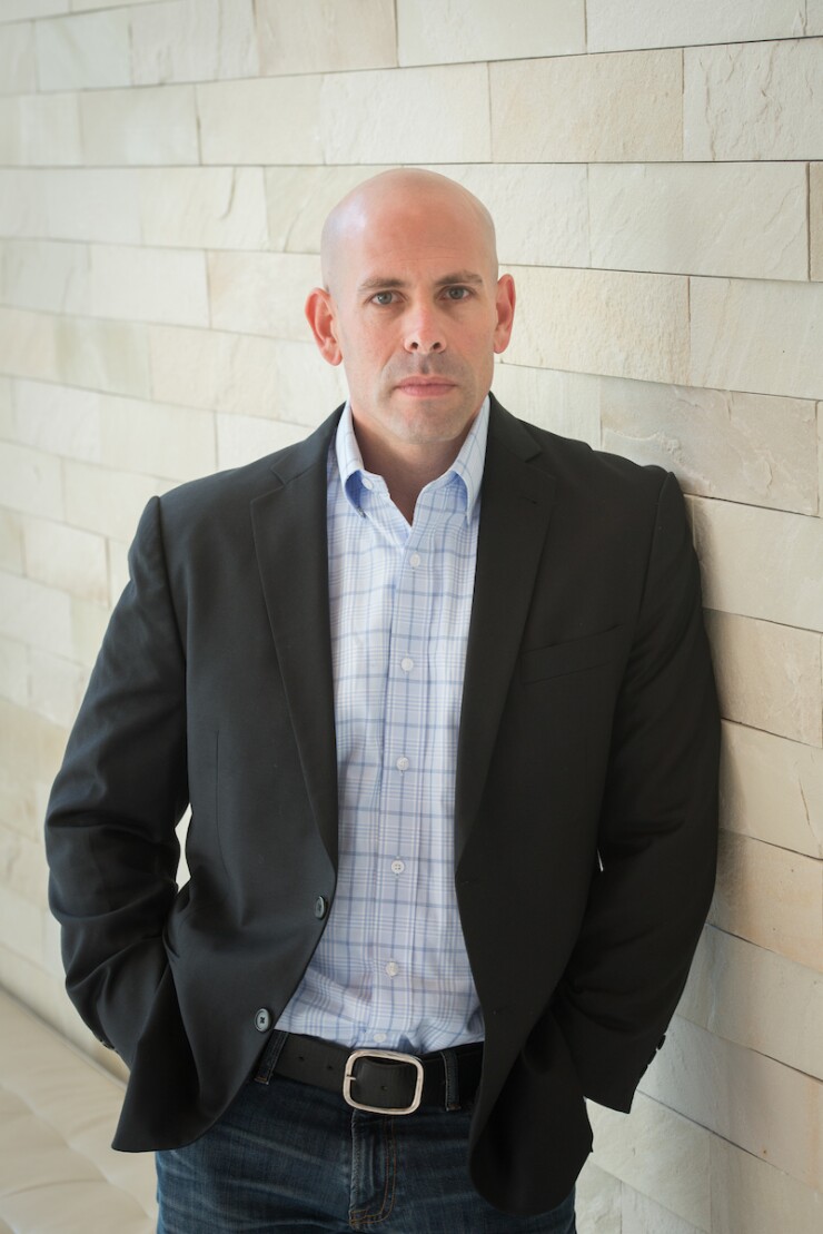 Greg Cohen, president of Paya