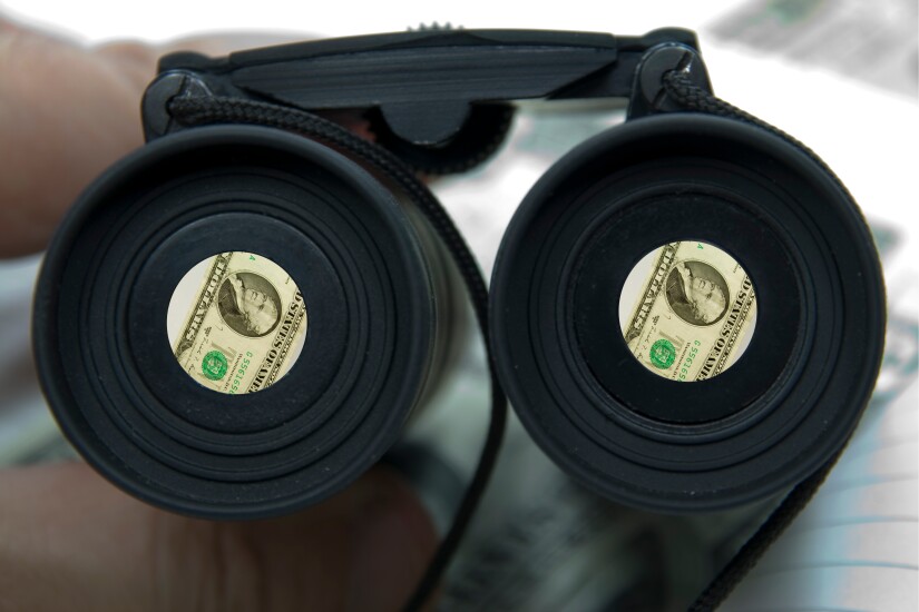 Binoculars and money, wealth