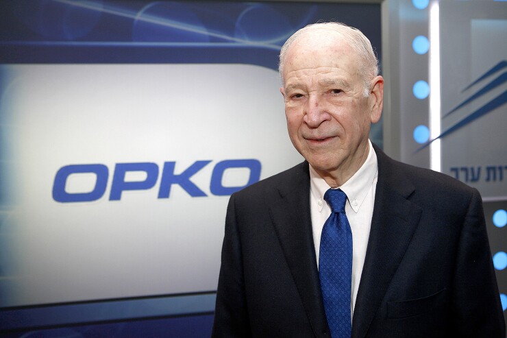 Phillip Frost, billionaire and chairman of Teva Pharmaceutical Industries Ltd., poses for a photograph at the Tel Aviv Stock Exchange in Tel Aviv, Israel, on Wednesday, Aug. 21, 2013. Frost was at the Tel Aviv Stock Exchange to mark the listing of Opko Health Inc., of which he is the largest shareholder. Photographer: Ariel Jerozolimski/Bloomberg *** Local Caption *** Phillip Frost